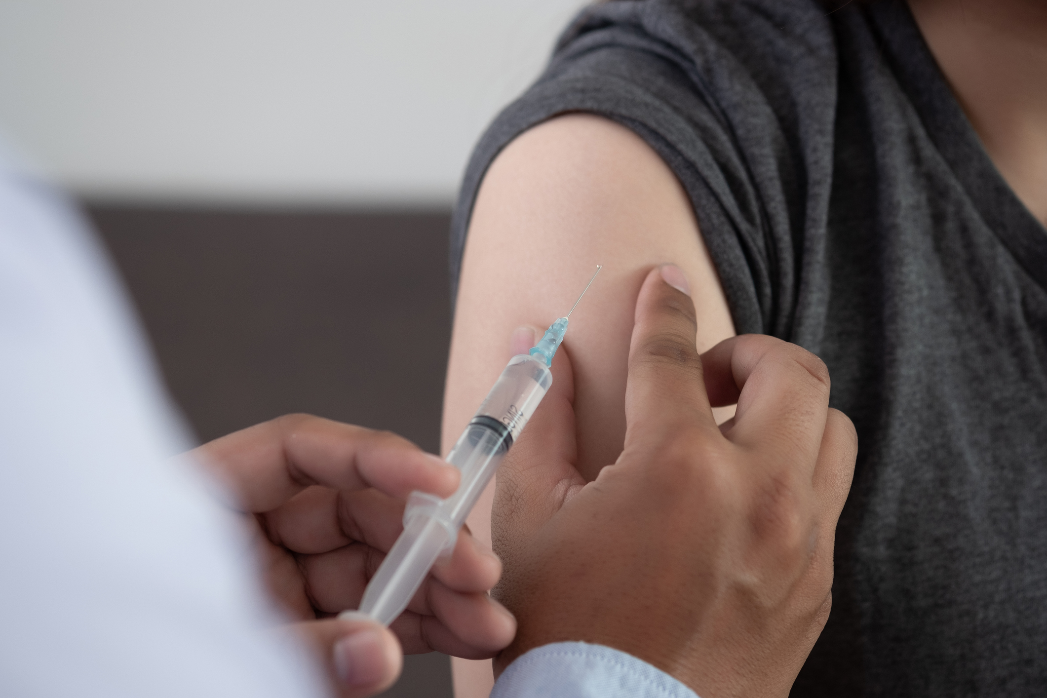 951780662 Medicine and health care concept Doctor giving patient vaccine insulin or vaccination
